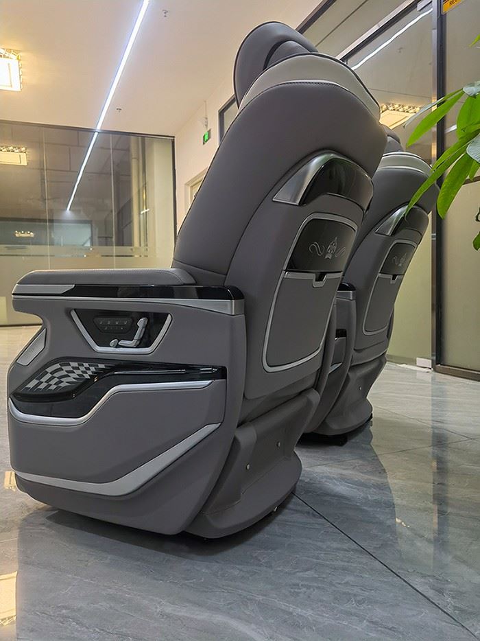 Luxury van seats with wireless charging and ambient lighting