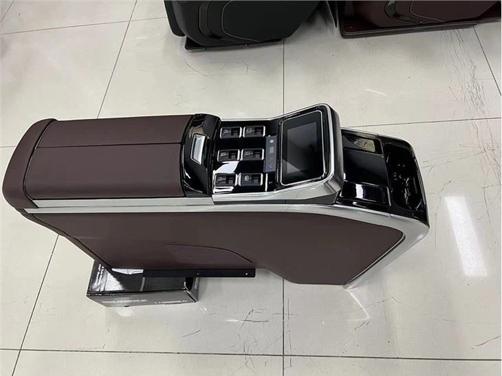 Car rear seat split armrest box with compressor refrigerator