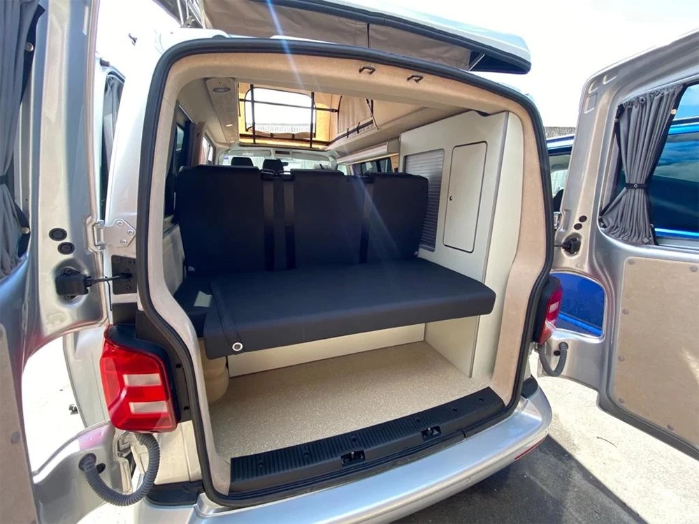 van seats fold into bed